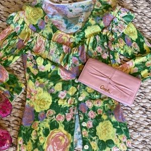 Cute flowery cardigan.